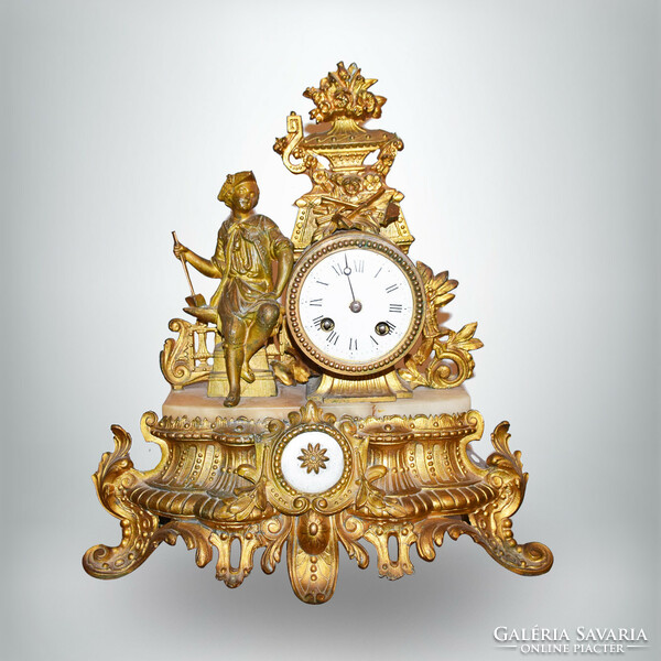 French fireplace mantel clock, figurative case with stone decorative elements