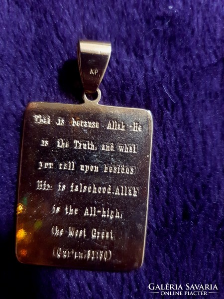 Islamic 22 carat gold plated pendant with an early quote on the back
