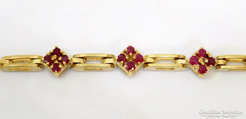 Gold bracelet with ruby stones (zal-au111825)