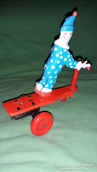 Old sheet metal factory in beautiful condition Roli Zoli metal clockwork working roller clown toy as shown in pictures