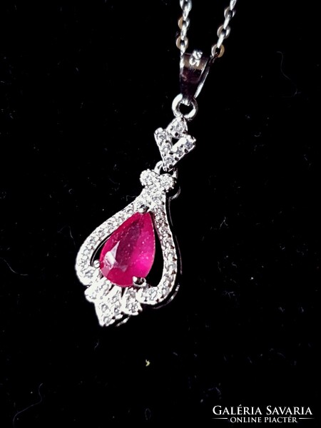 Beautiful silver pendant with a ruby gemstone