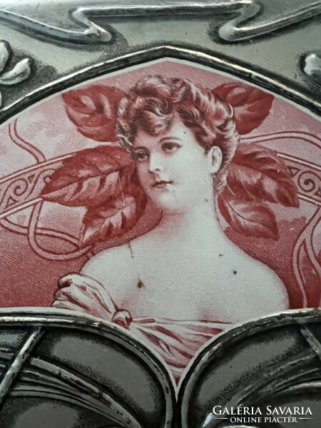 Beautiful art nouveau embossed metal box with a female portrait with violets