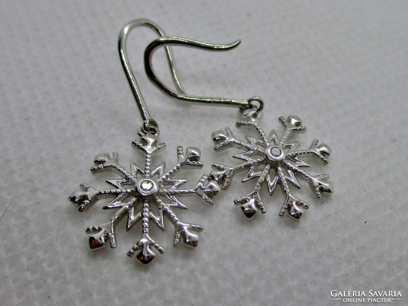 Beautiful snowflake silver earrings with diamonds