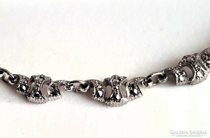 Silver necklaces richly decorated with marcasite