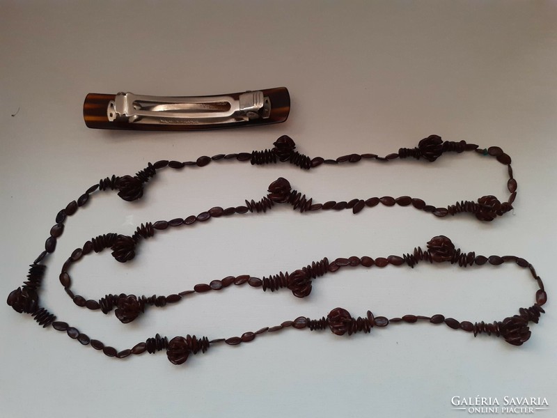 Old retro long necklace made of apple seeds in good condition