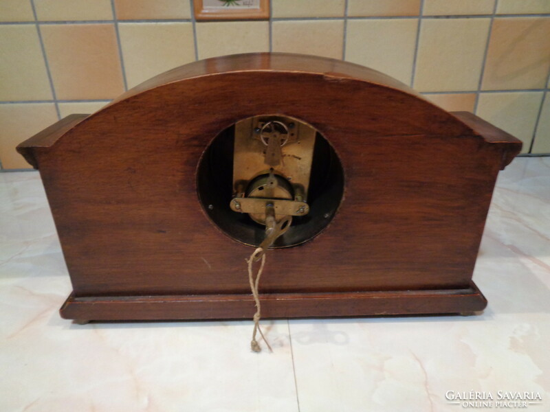 Antique clock in a wooden case