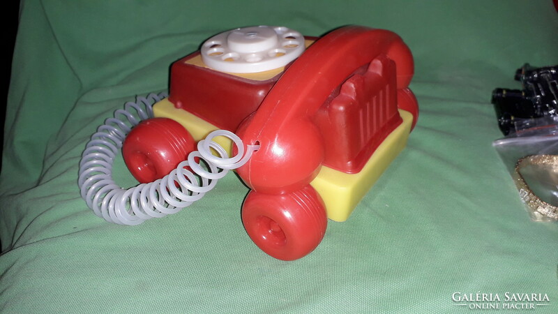 Flawless traffic goods old Hungarian small-scale rattle rolling toy plastic phone according to the pictures 1.