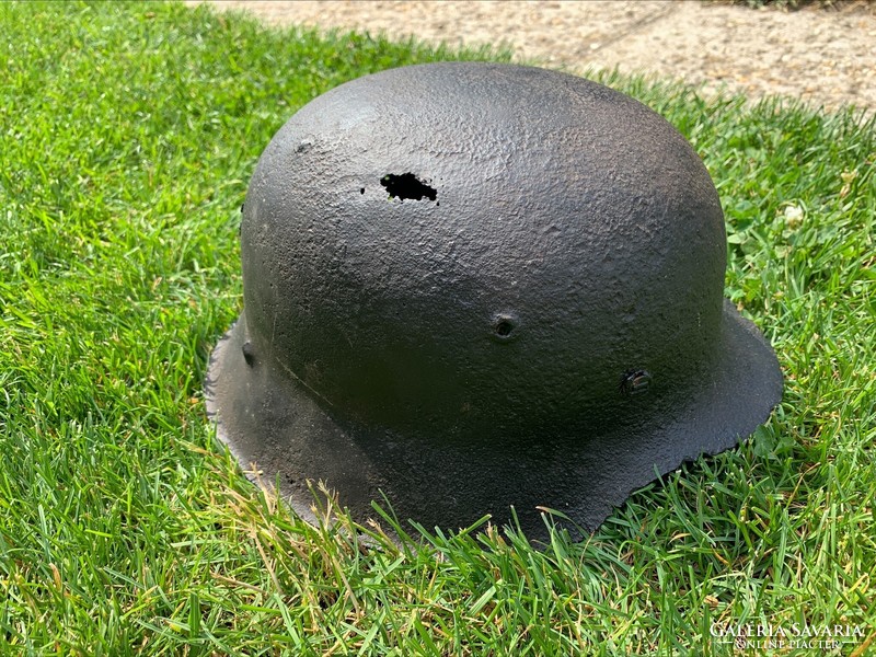 II. WW2 German m42 helmet with shrapnel hit