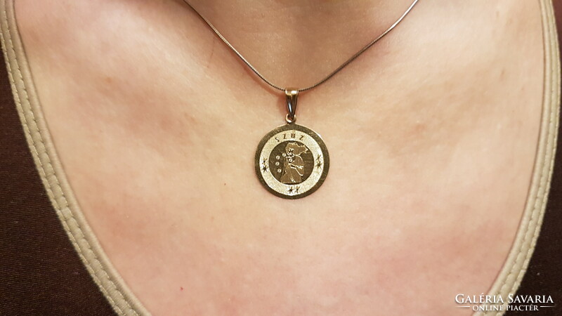 Virgo horoscope gold pendant with a beautiful engraved pattern