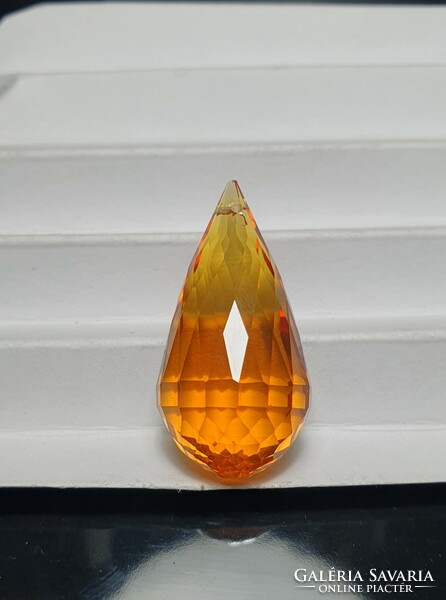 Citrine pendulum polished to a drop shape.