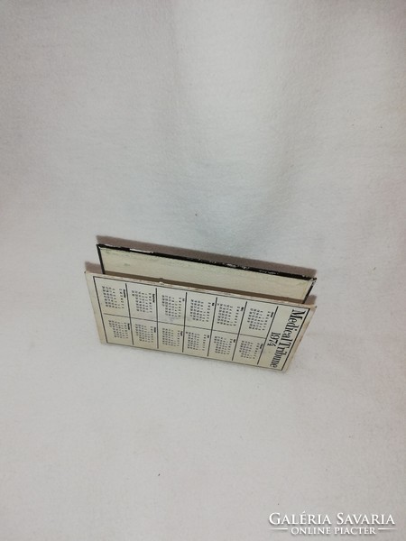 Extremely rare metal napkin holder with 1974 calendar inscribed medical tribune