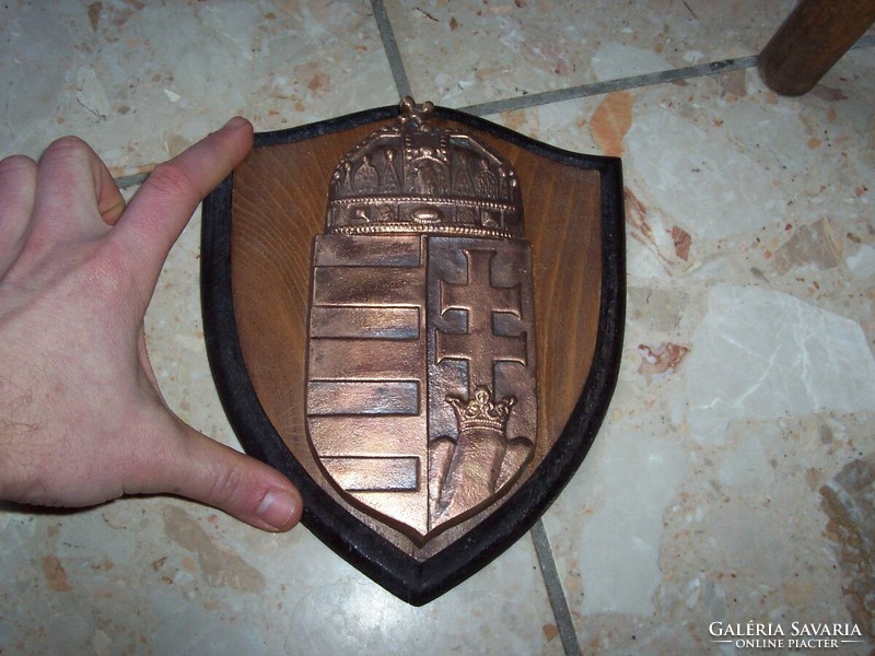Hungarian coat of arms on a beautiful wooden back