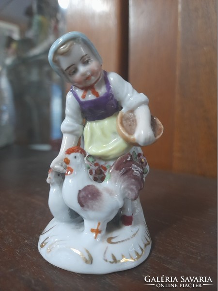 German, Germany ludwigsburg 19th century porcelain figurine of a little girl feeding poultry. 7 Cm.