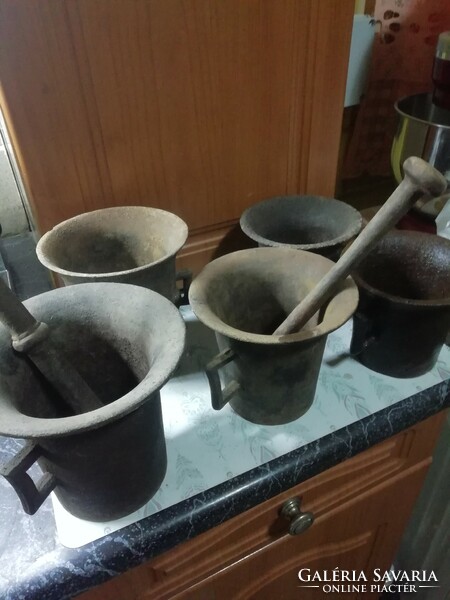 Antique iron mortars are in the condition shown in the pictures