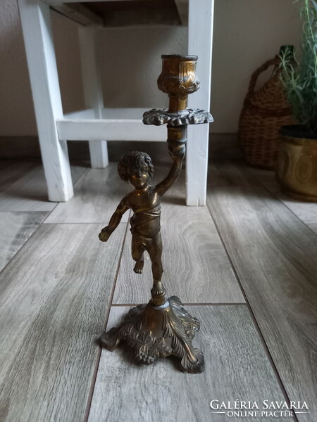 Nice old bronze candle holder with putt (24.5x10.2 cm)