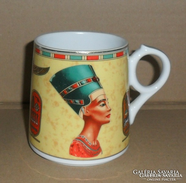 Fine royal porcelain sculpture Nefertiti gilded mug.