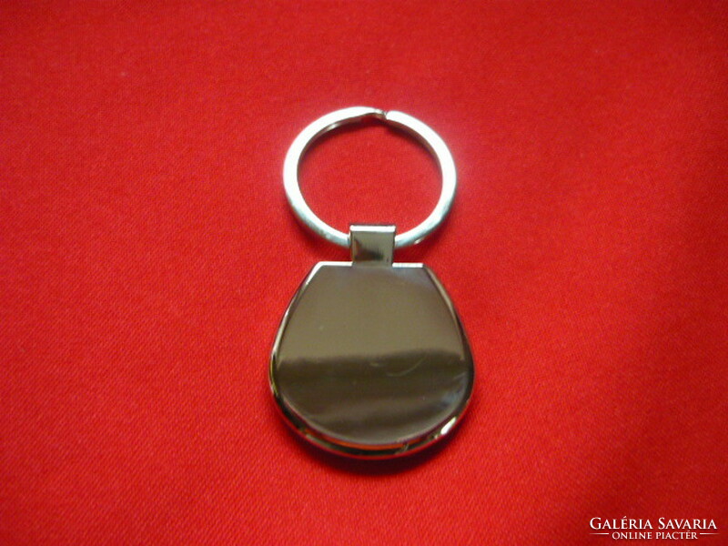 Daf oval metal keychain