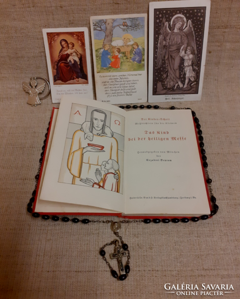Old German-language scott's measurement book for the smallest children with a rosary at Mass