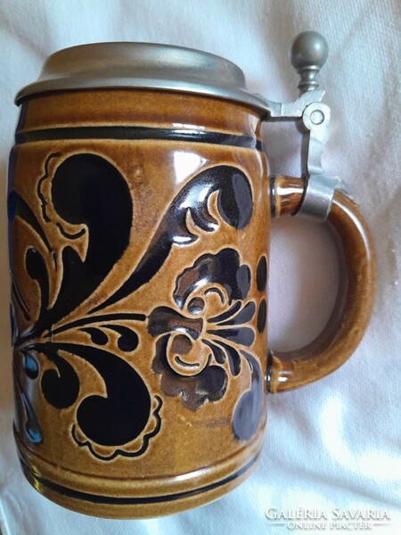 On lid motif jug is beautiful