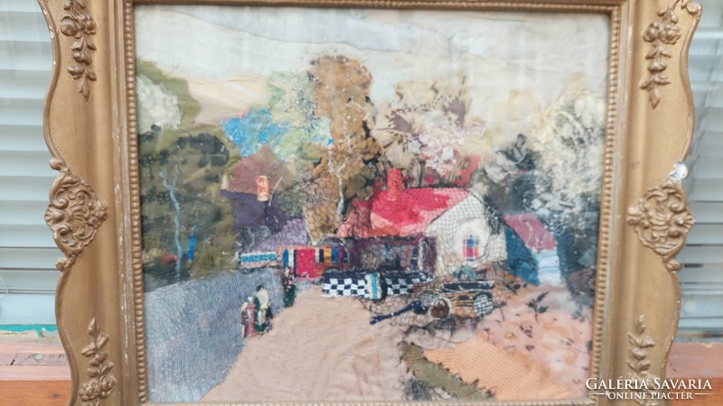 A picture applied from fabrics, a street scene