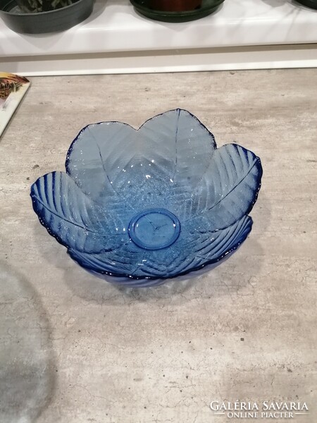 Blue glass bowl in the shape of a flower cup