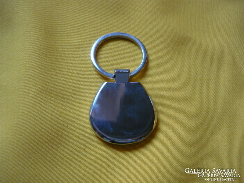 Bobcat oval metal keychain