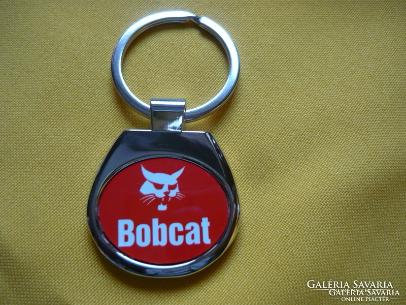 Bobcat oval metal keychain