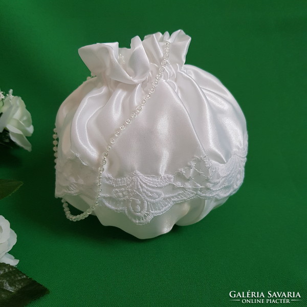 New, custom-made snow-white, lacy, satin bridal gown, small bag