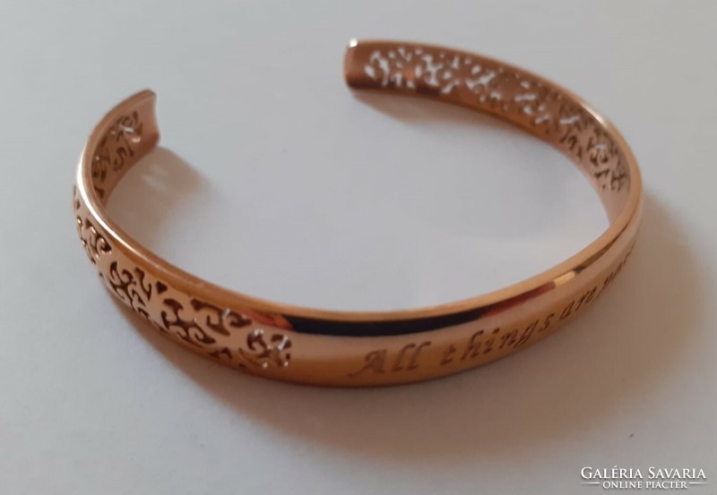 Motivational bracelet with an openwork pattern