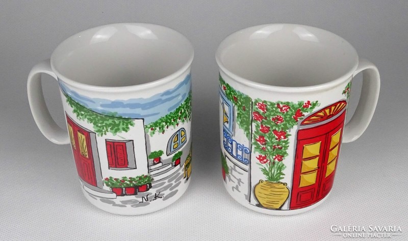 Pair of Greek porcelain mugs marked 1Q031