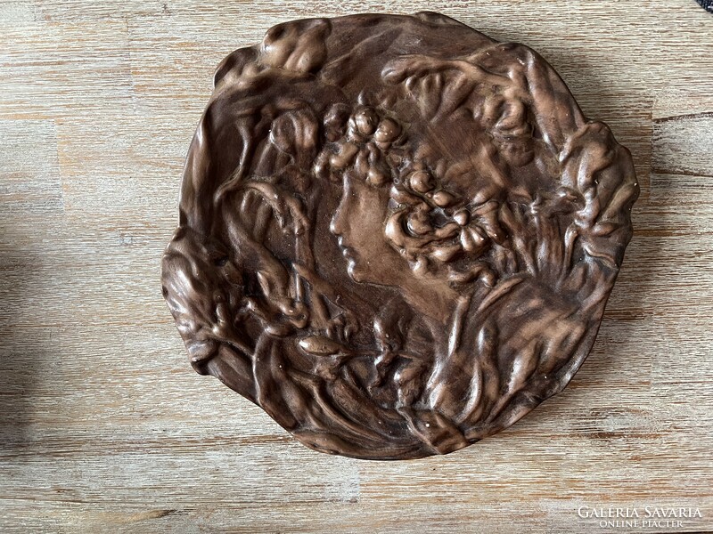 Art Nouveau ceramic wall bowl with a female portrait