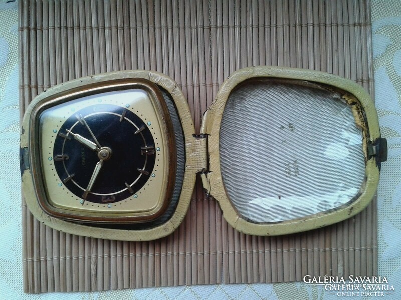Old travel watch with 7 stone images