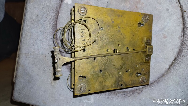 Antique clock mechanism marked Gustav Becker