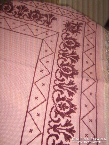 Beautiful hand-embroidered cross-stitch woven tablecloth with a lace edge
