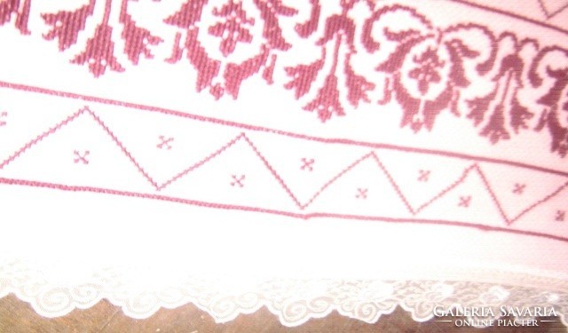 Beautiful hand-embroidered cross-stitch woven tablecloth with a lace edge