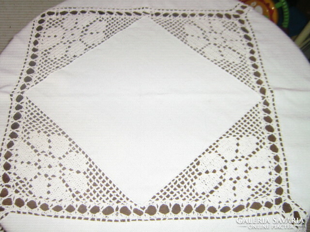 Beautiful tablecloth with beautiful handmade crochet inserts and crochet edges
