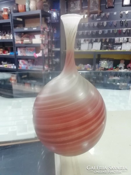 A glass vase with a special pattern