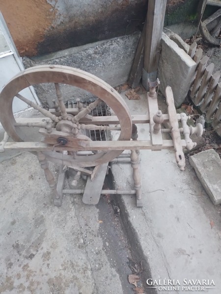 Antique wheelchair, in need of repair