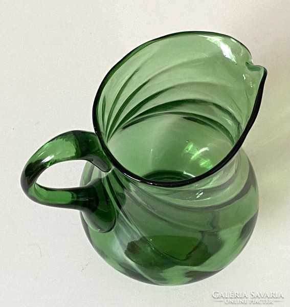 Green colored blown glass jug with a twisted pattern 20.5 Cm