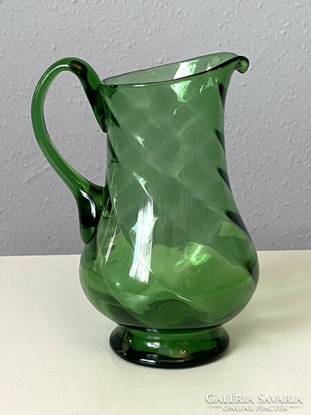 Green colored blown glass jug with a twisted pattern 20.5 Cm