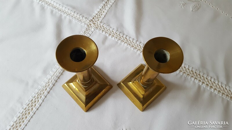 A pair of brass candlesticks