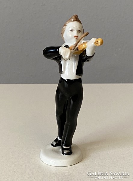 A boy playing the violin, painted Raven House porcelain figure 14 cm