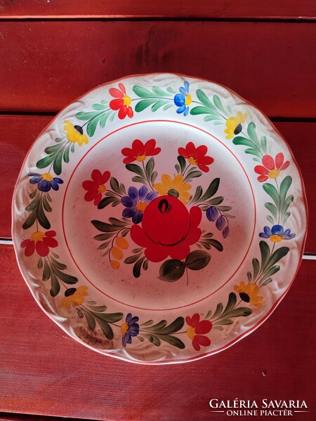 Decorative wall plate painted on porcelain