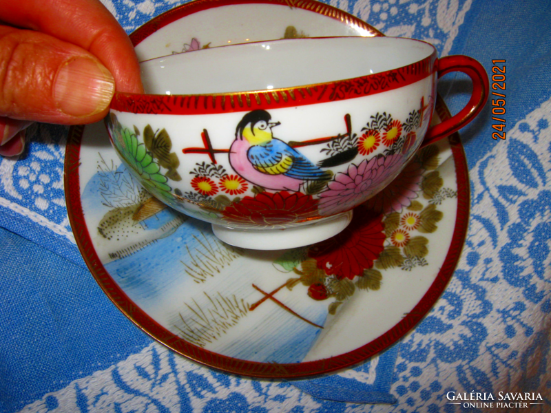 A wonderful bird's eggshell oriental cup and plate