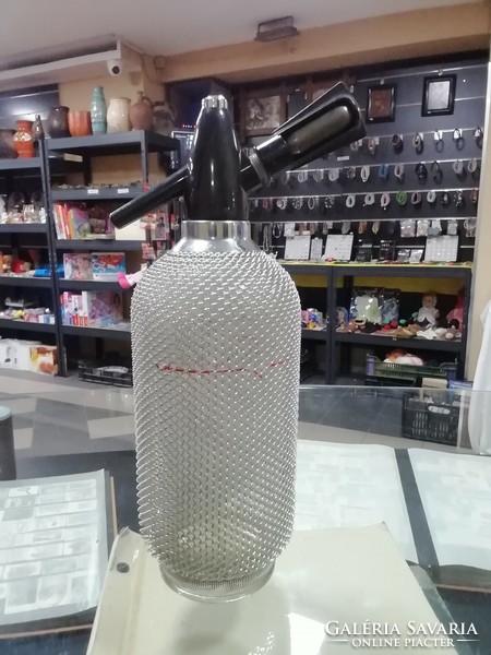 Retro metal mesh coated soda bottle
