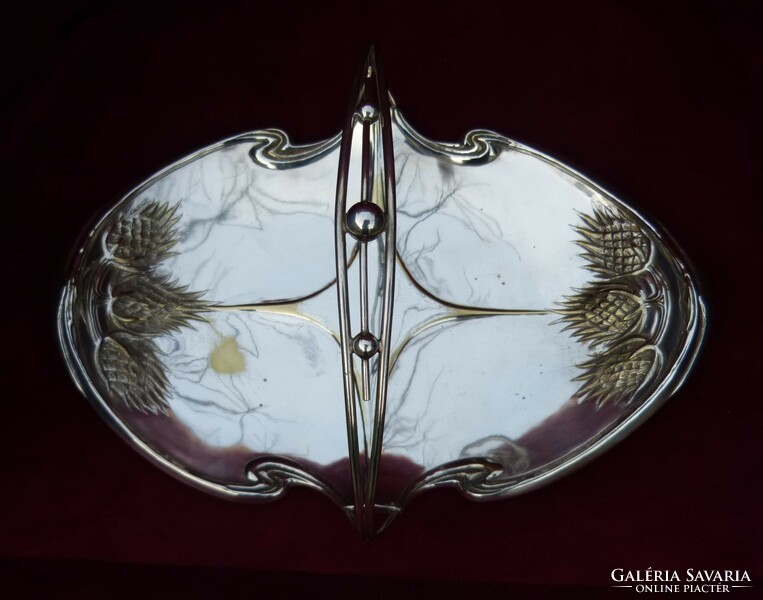Art Nouveau offering / silver-plated copper.