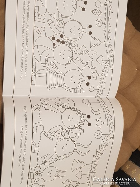 A gift of berries and a doll - Advent coloring book is new