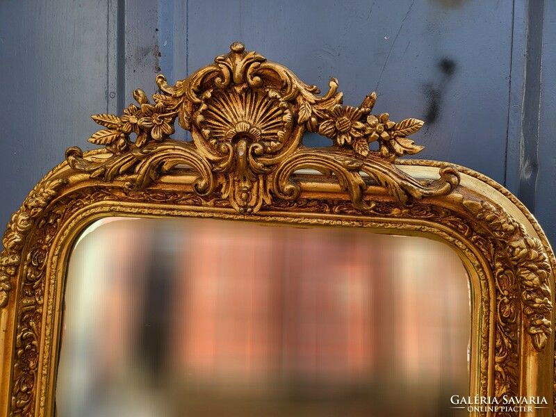 Gilded French mirror with shell decoration
