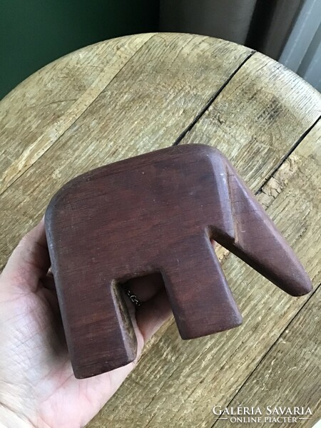 Old stylized wooden elephant statue, perhaps rosewood?