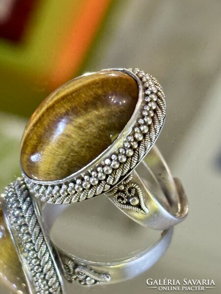 A beautiful silver ring, decorated with a large tiger's eye stone